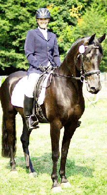 Dr. Christie on Tyberius, her Friesian/Arab cross